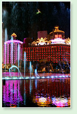 photo of the city of macau at night - gambling area