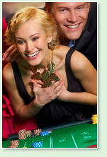 couple playing roulette and smiling